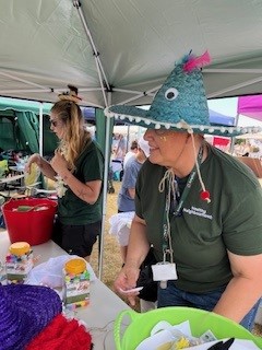 Amplius Youth Workers running craft stall